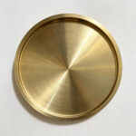 Custom floor plate covers manufactured for industrial equipment access areas with durable metal construction